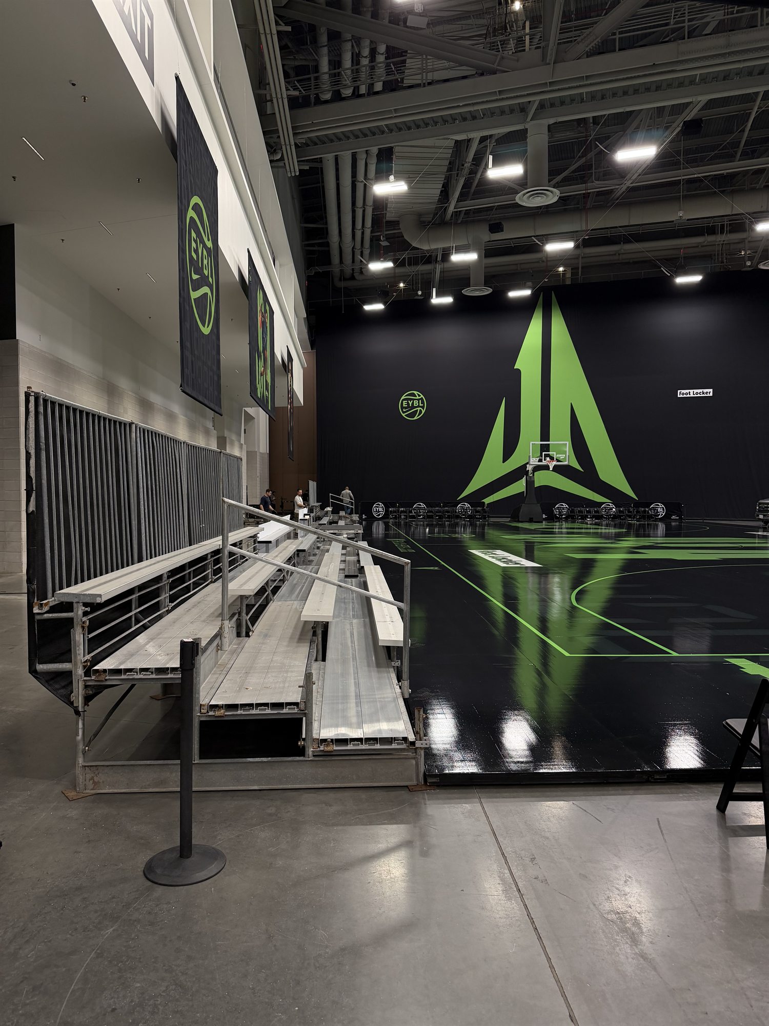 Indoor bleachers beside a professional event basketball court