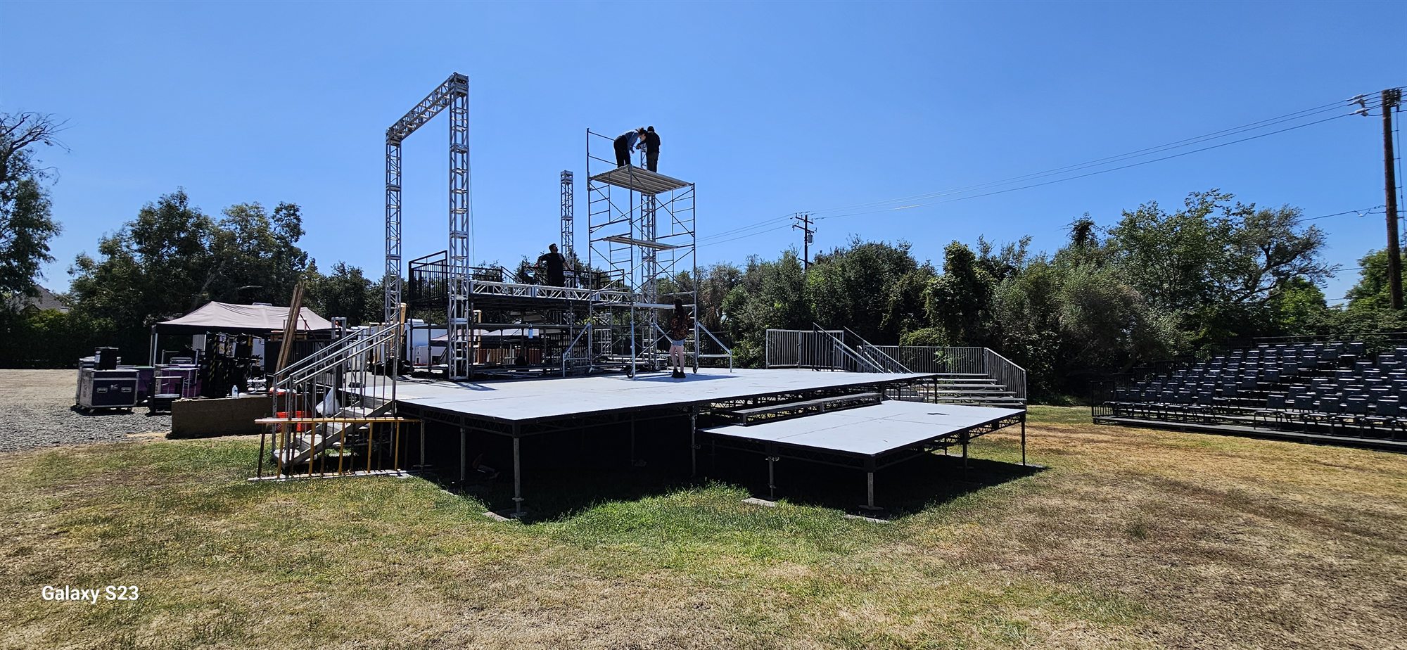 Outdoor event stage and seating installation in progress