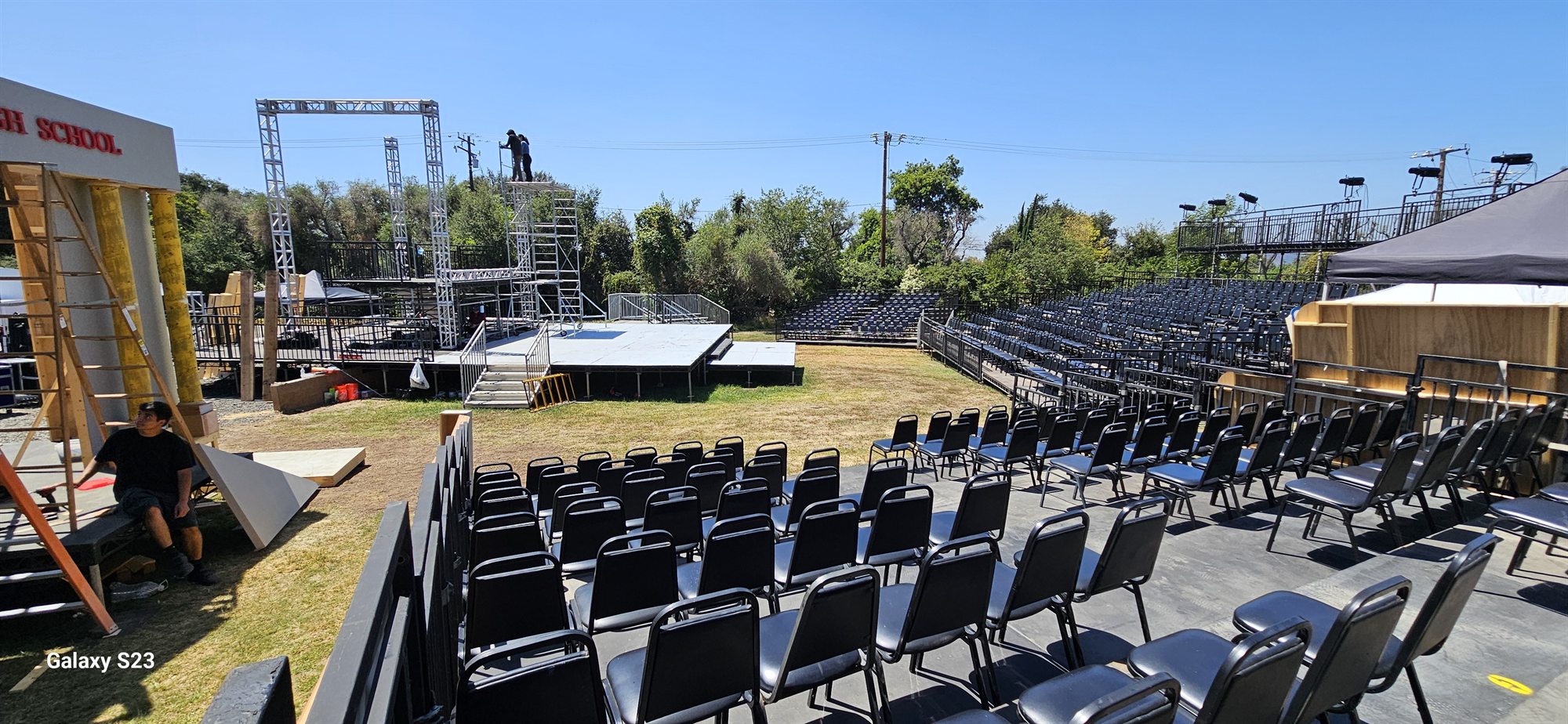 Outdoor production seating overlooking a temporary stage
